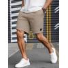 imageUOUA Mens Casual 7quot Shorts Drawstring Elastic Waist Texture Summer Beach Sweat Shorts with PocketsKhaki